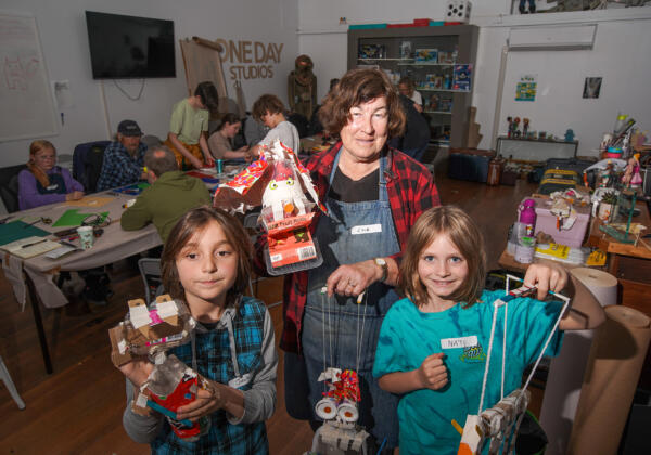 Holiday Actors members Jake, Lyal and Nate participate in a puppet making workshop at One Day Studios, here with their trash puppets.